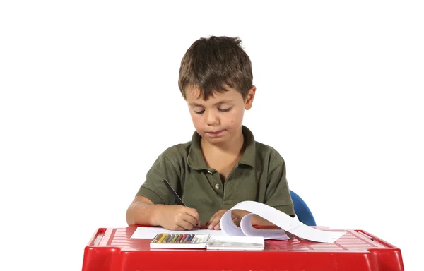 Kleiner Junge zeichnet — Stockfoto