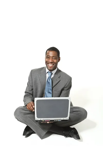 Homem de negócios com laptop — Fotografia de Stock