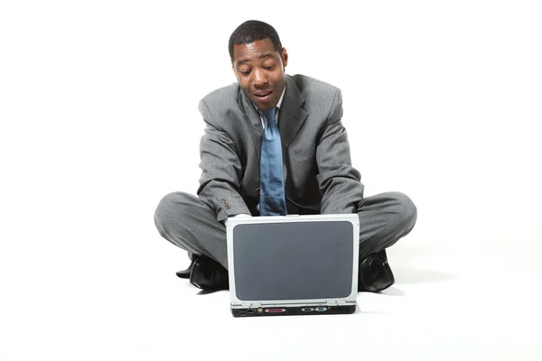 Homem de negócios com laptop — Fotografia de Stock