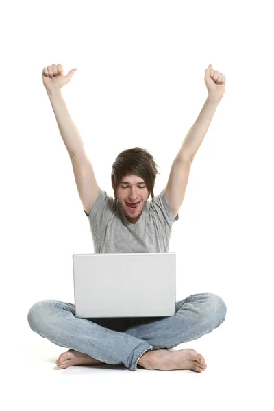 Gelukkig man met laptop — Stockfoto