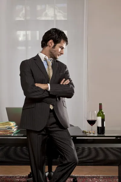 Businessman with wine — Stock Photo, Image
