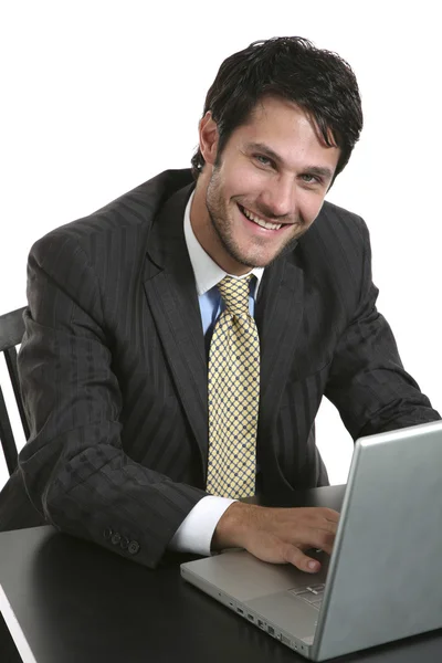 Бизнесмен с ноутбуком Лицензионные Стоковые Изображения