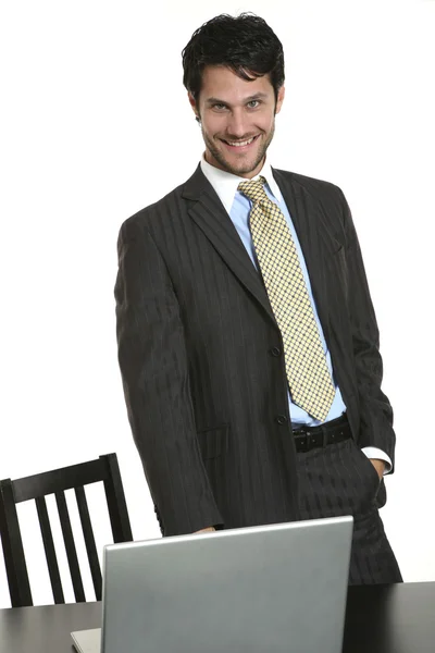 Businessman with laptop Royalty Free Stock Photos