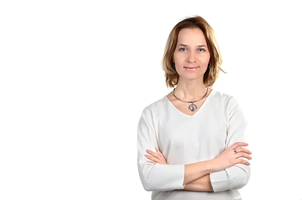 Happy girl with crossed arms on white background — Stock Photo, Image