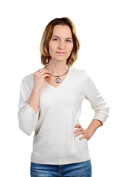 Portrait of attractive woman in jeans showing her jewelry — Stock Photo, Image