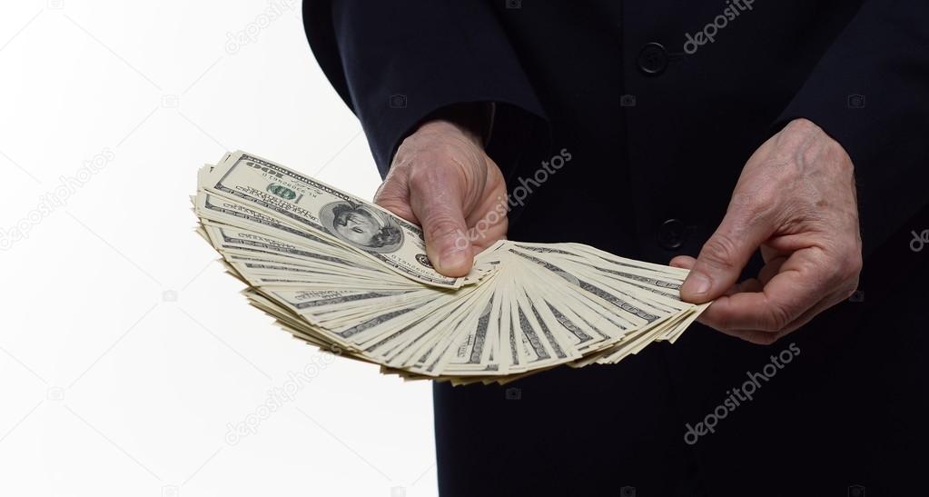Man counting  US dollar money