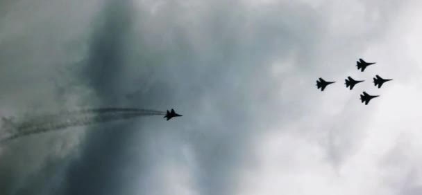 Aerobatic team Strizhi and Russian Knights make firework during the demonstration flight. 15th of May 2021 Kubinka, Moscow region — Stock Video