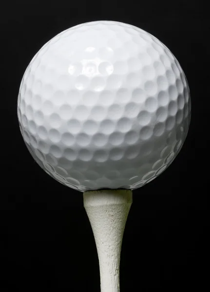 Μπάλα του γκολφ σε μαύρο — Φωτογραφία Αρχείου