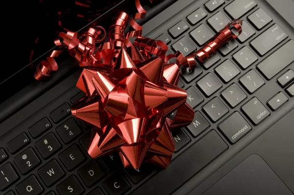 Red Ribbon on Laptop — Stock Photo, Image