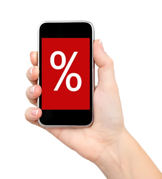 Female hand holding a phone with sale on a red screen — Stock Photo, Image