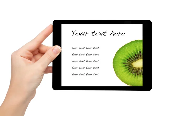 Woman hand hold a mini tablet with kiwi on a screen — Stock Photo, Image
