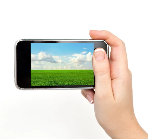 Woman hand holding the phone with the image — Stock Photo, Image