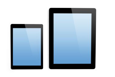 büyük bilgisayar ve yalıtılmış zemin üzerine mini tablet