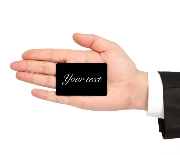Izolované ruka podnikatel v obleku drží vizitku — Stock fotografie