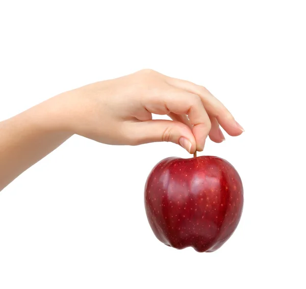 Mano de mujer sobre fondo aislado sosteniendo una manzana roja — Foto de Stock