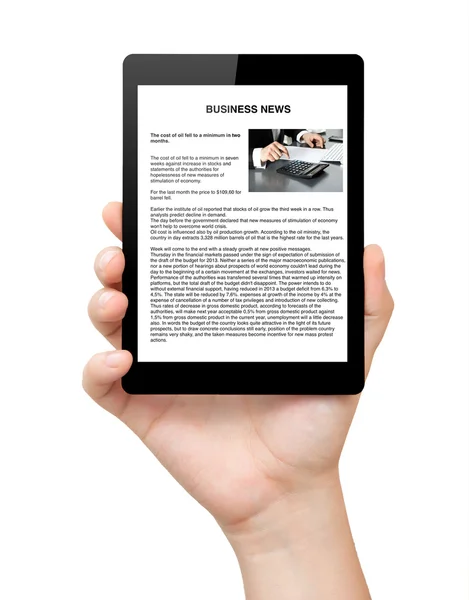 Isolated mans hand holding a tablet with business news on screen — Stock Photo, Image