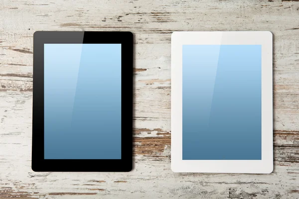 Computer tablet bianco e nero con schermo blu — Foto Stock