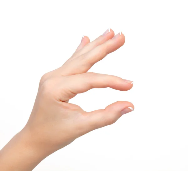 Mão mulher isolada mostra beliscão para zoom ou segurando objeto — Fotografia de Stock