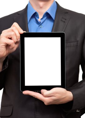 Elinde tablet olan bir iş adamı.