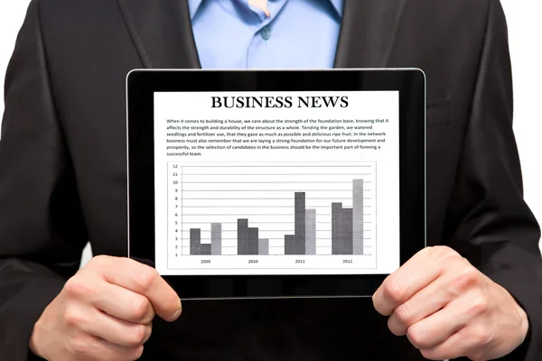 Businessman holding a tablet — Stock Photo, Image