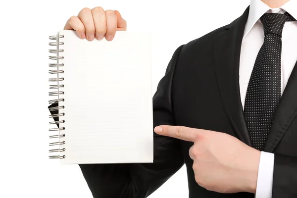 Isolated businessman in a suit and tie, holding a notebook — Stock Photo, Image