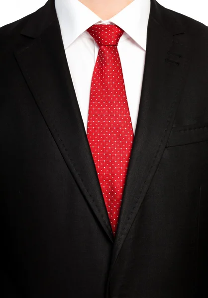 Geschäftsmann im schwarzen Anzug mit roter Krawatte — Stockfoto