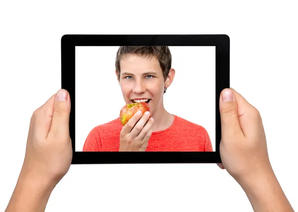 Men hands with a tablet touch computer gadget with a boy and a r — Stock Photo, Image