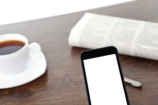 Tach telefoon met geïsoleerde scherm op een tafel in een zakenman — Stockfoto