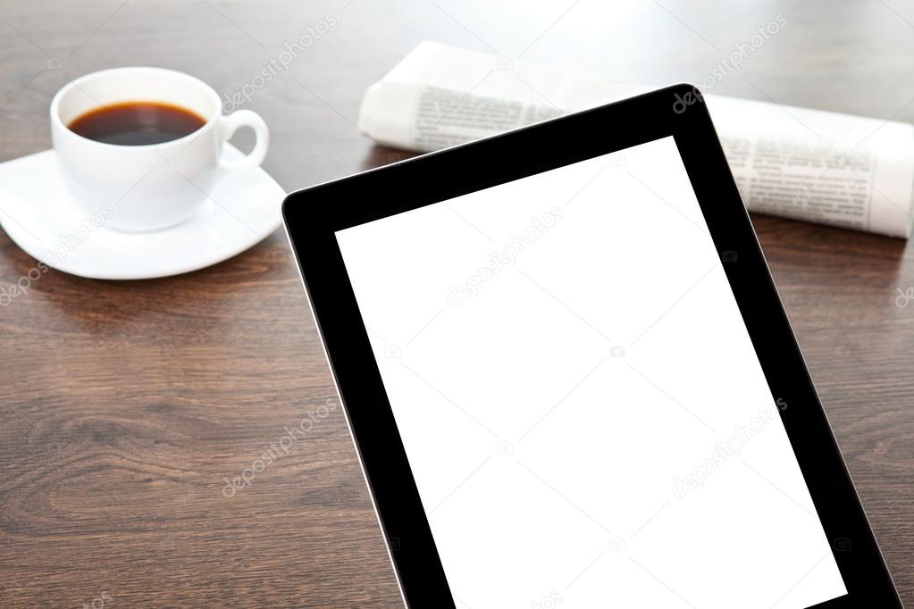 tablet with isolated screen on a table at a businessman