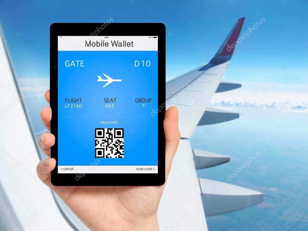 man hand holding the tablet with mobile wallet and plane ticket