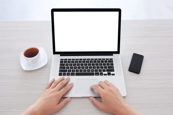 Male hands typing on a laptop keyboard in the office — Stock Photo, Image