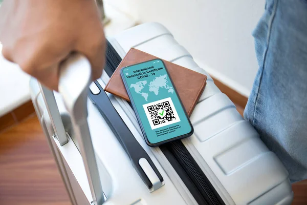 Male Hands Holding Phone International Vaccination Certificate Covid Screen Background — Stock Photo, Image