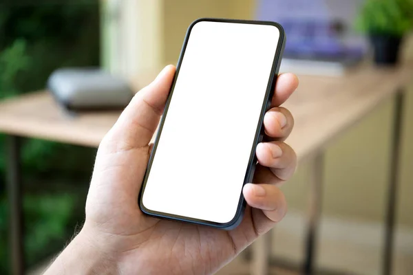 Man Hand Telefoon Met Geïsoleerd Scherm Achtergrond Van Het Kantoor — Stockfoto