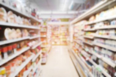 Arkaplan için alışveriş merkezinin iç kısmında bulunan bulanık süpermarket