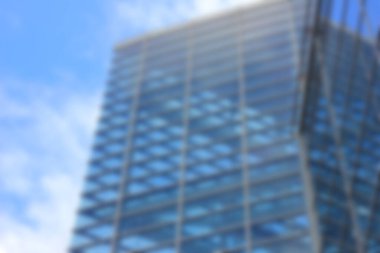 Abstract blur modern glass building exterior. 
