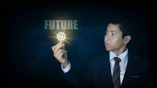 Businessman Holding Light Bulb Gear Icon Virtual Screen Word Future — 图库照片