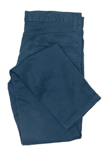 Pantalones Vaqueros Azules Plegados Aislados Sobre Fondo Blanco —  Fotos de Stock
