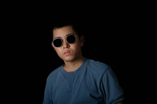 Portrait Asia Man Wearing Sunglasses Blue Shirt Black Background — Fotografia de Stock