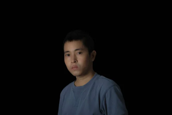 Portrait Young Man Wearing Blue Shirt Looking Camera Black Background — ストック写真