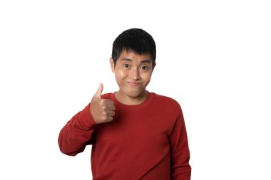 Young man showing approving doing positive gesture with hand for success. winner gesture. Human emotion face expression concept. Studio shot isolated on white background. copy space.