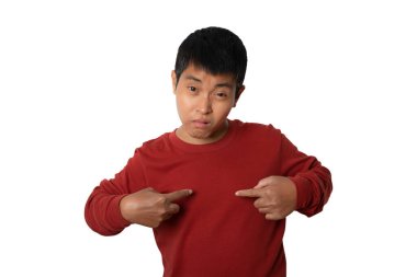 Portrait of young man pointing at self, himself. Human emotion face expression concept. studio shot isolated on white background. copy space.