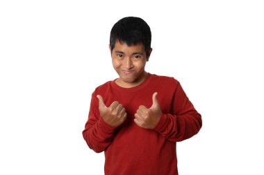 Portrait of young asian man showing approving doing positive gesture with hand for success. winner gesture. Human emotion face expression concept. Studio shot isolated on white background. copy space.