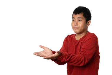Portrait of young man showing presenting by hand. Human emotion expression concept. Studio shot isolated on white background. copy space.