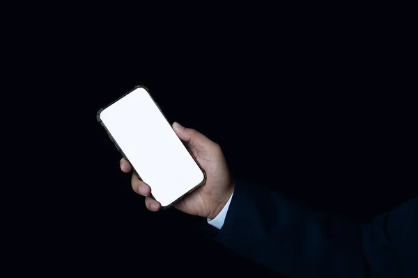 Businessman Hand Holding Smartphone Blank White Full Screen Black Background — Foto Stock