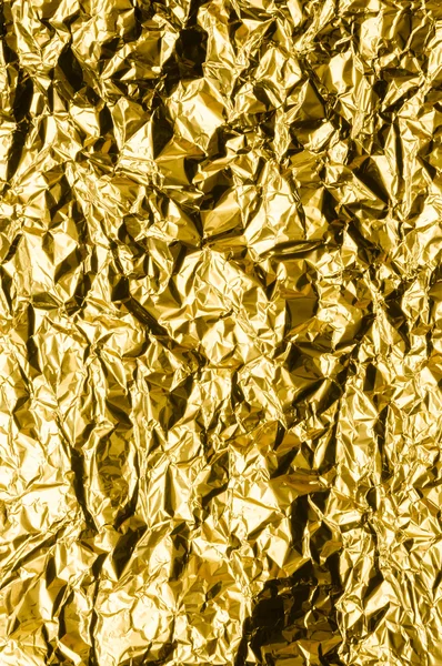 Verfrommeld goud folie — Stockfoto