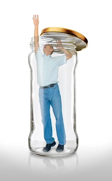 Man Escapes from a Glass Jar — Stock Photo, Image