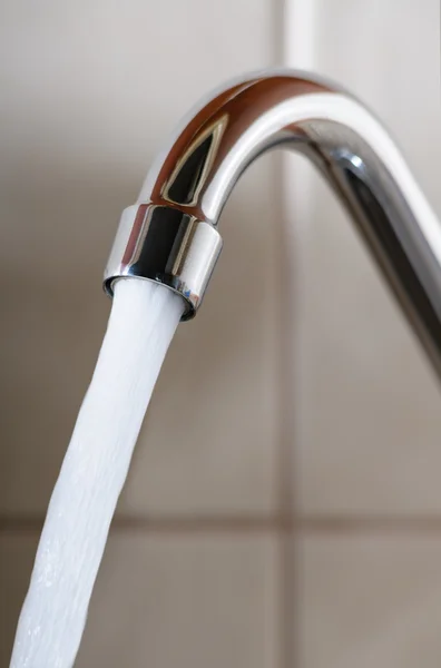 Tap with Water Flowing Strongly