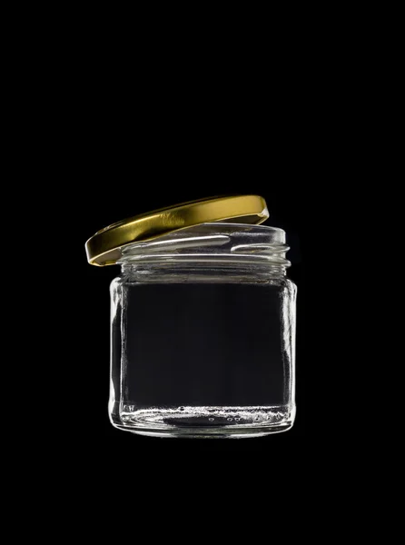 Glazen pot met open deksel — Stockfoto
