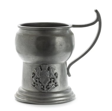 Antique pewter pitcher, with engraved Coat of Arms, isolated on white background