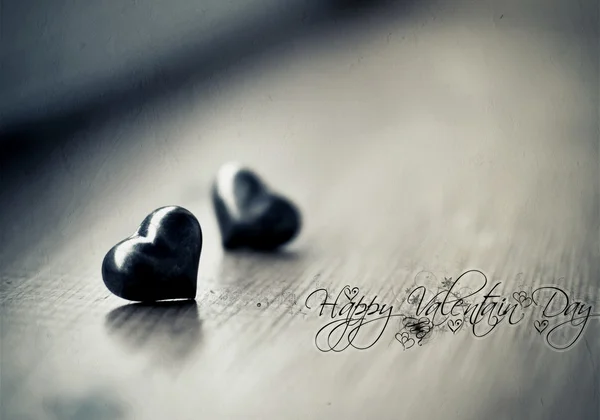 Stones in the form of heart on a gray background